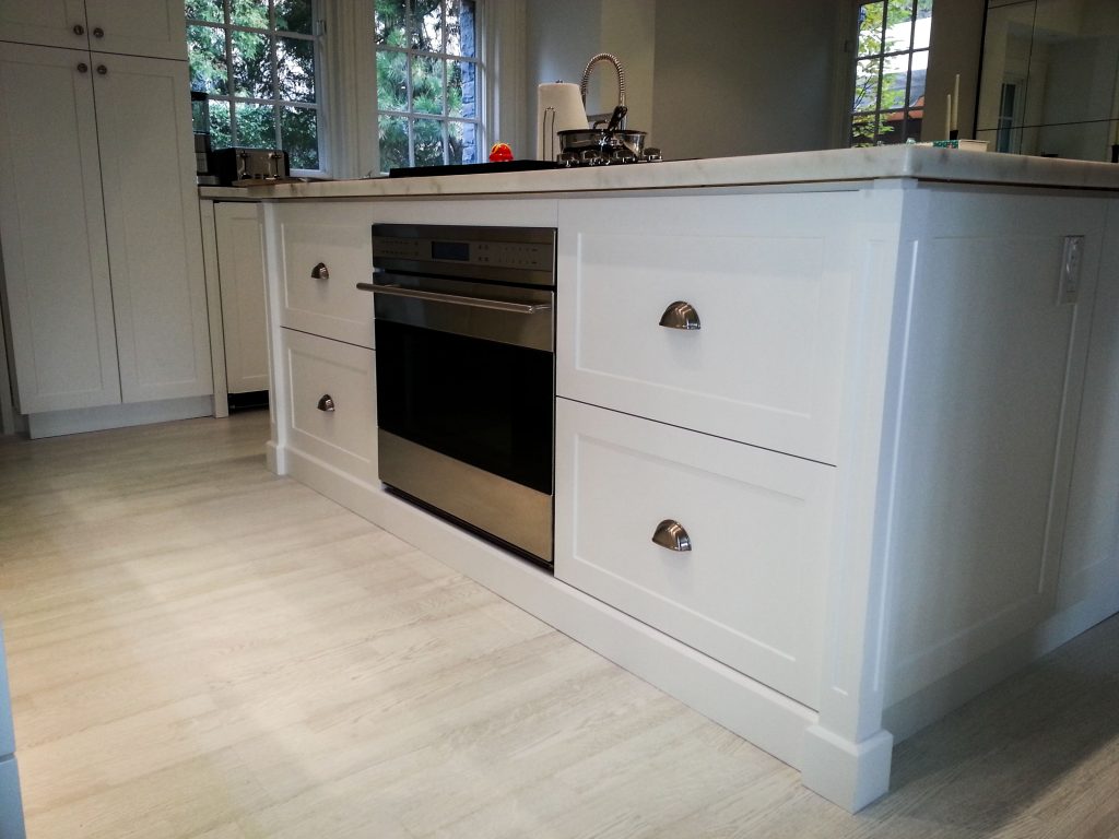 white kitchen cabinets built by design