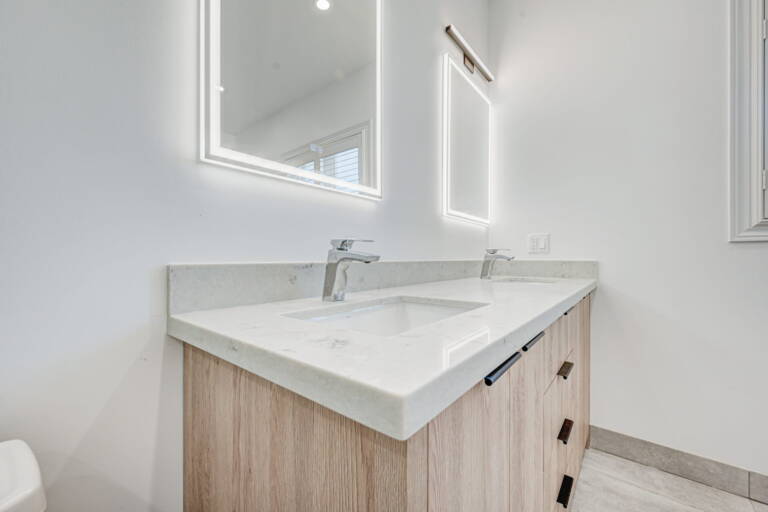 vanity-with-sinks-andiluminated-mirrors