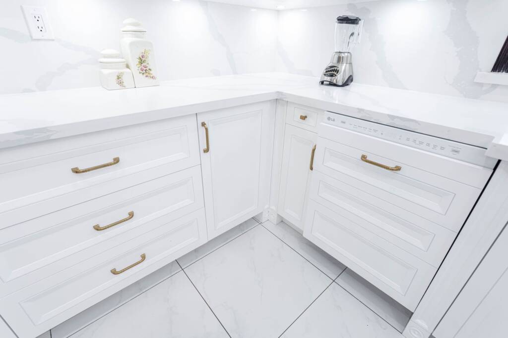 condo kitchen white drawers and champagne color handle