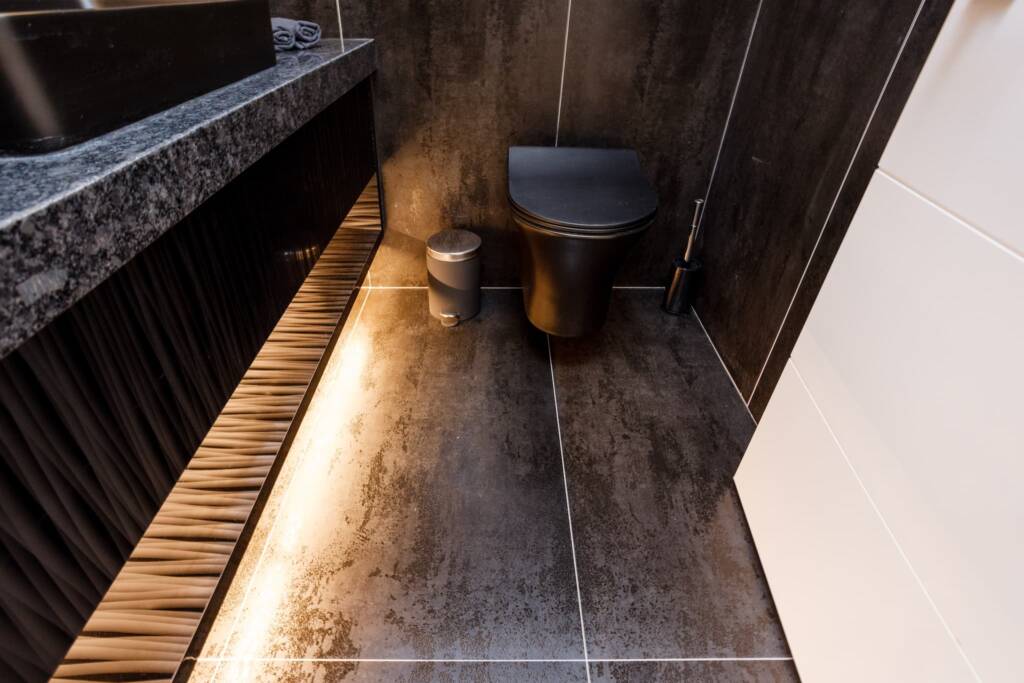 lighted ground stylish bathroom with black ground