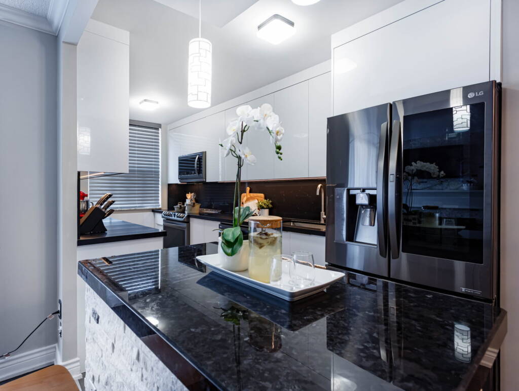 high gloss custom kitchen cabinets with a quartz island